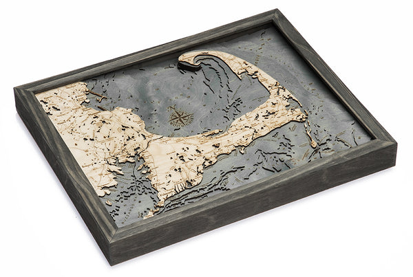 Cape Cod, Massachusetts wood chart map made using dark green and natural wood on white background laying flat